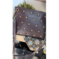 Bolso tachuelas piel