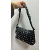 Bolso negro tachuela